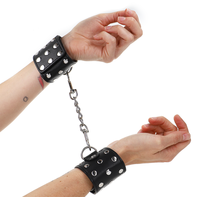 KINK - WRIST RESTRAINTS WITH SNAP FASTEN FULL OF RIVETS BLACK ADJUSTABLE 19-24 CM X 5.5 CM